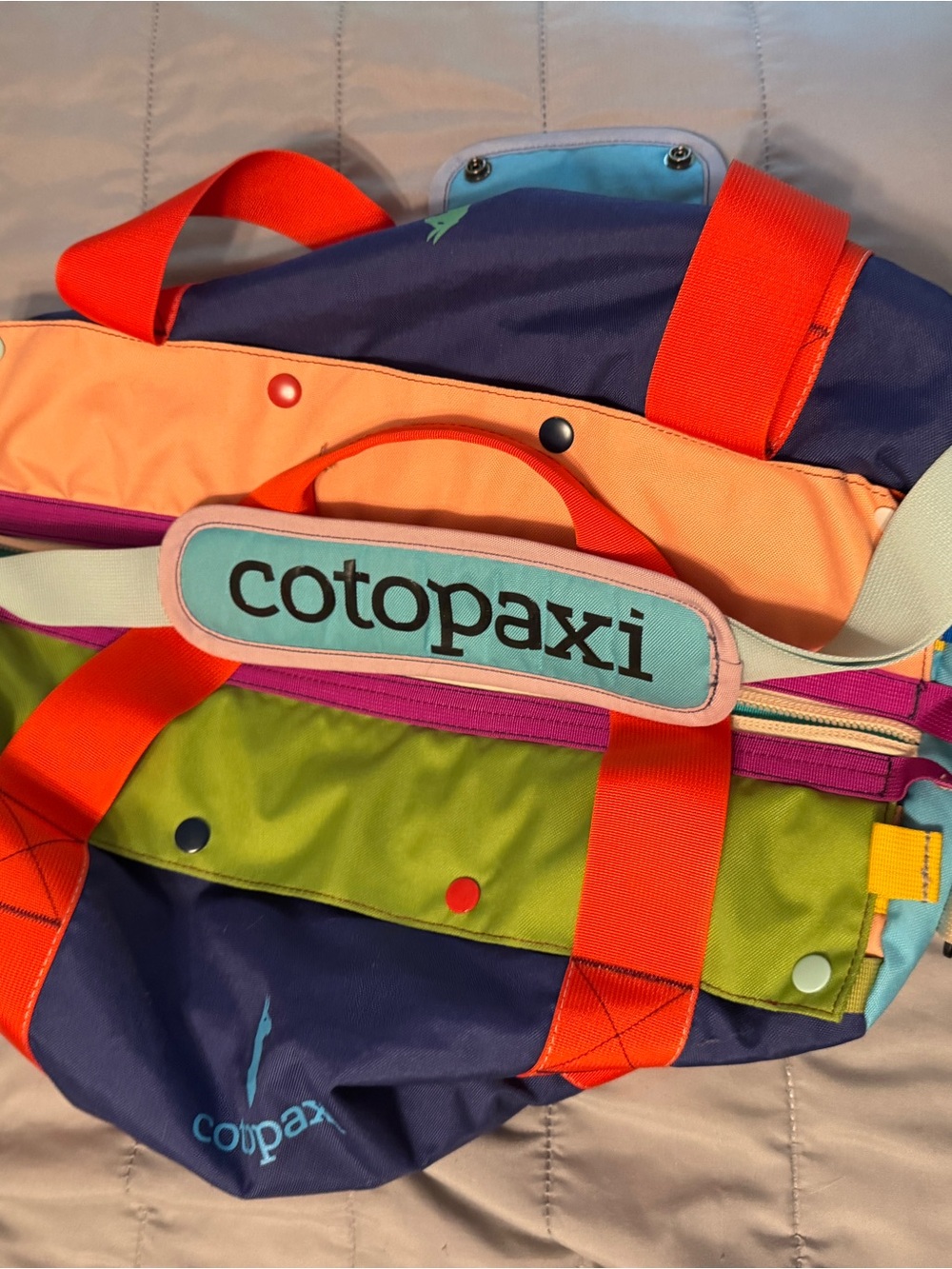 cotopaxi Bright Multicolor Kids Duffel with Orange Straps